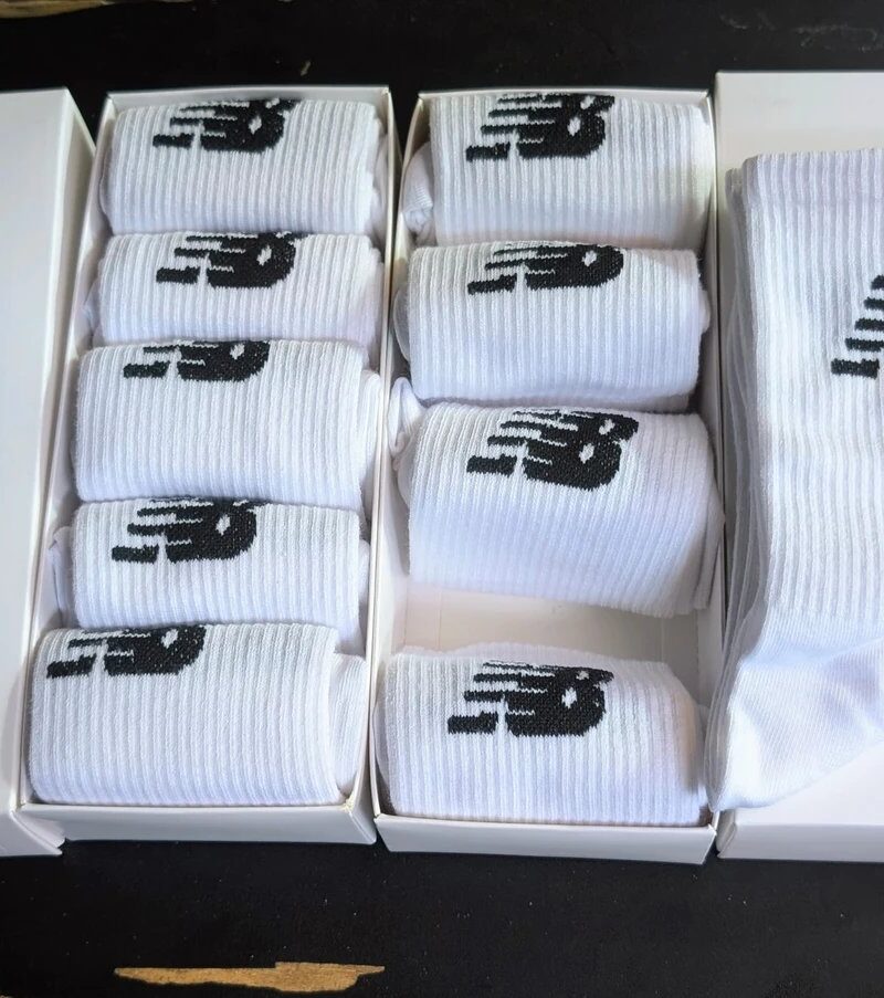 ￼￼

5 Pack Set Cotton New Balance Unisex Classic White, Ribbed Crew Socks Essential for Everyday Athletic Comfort
